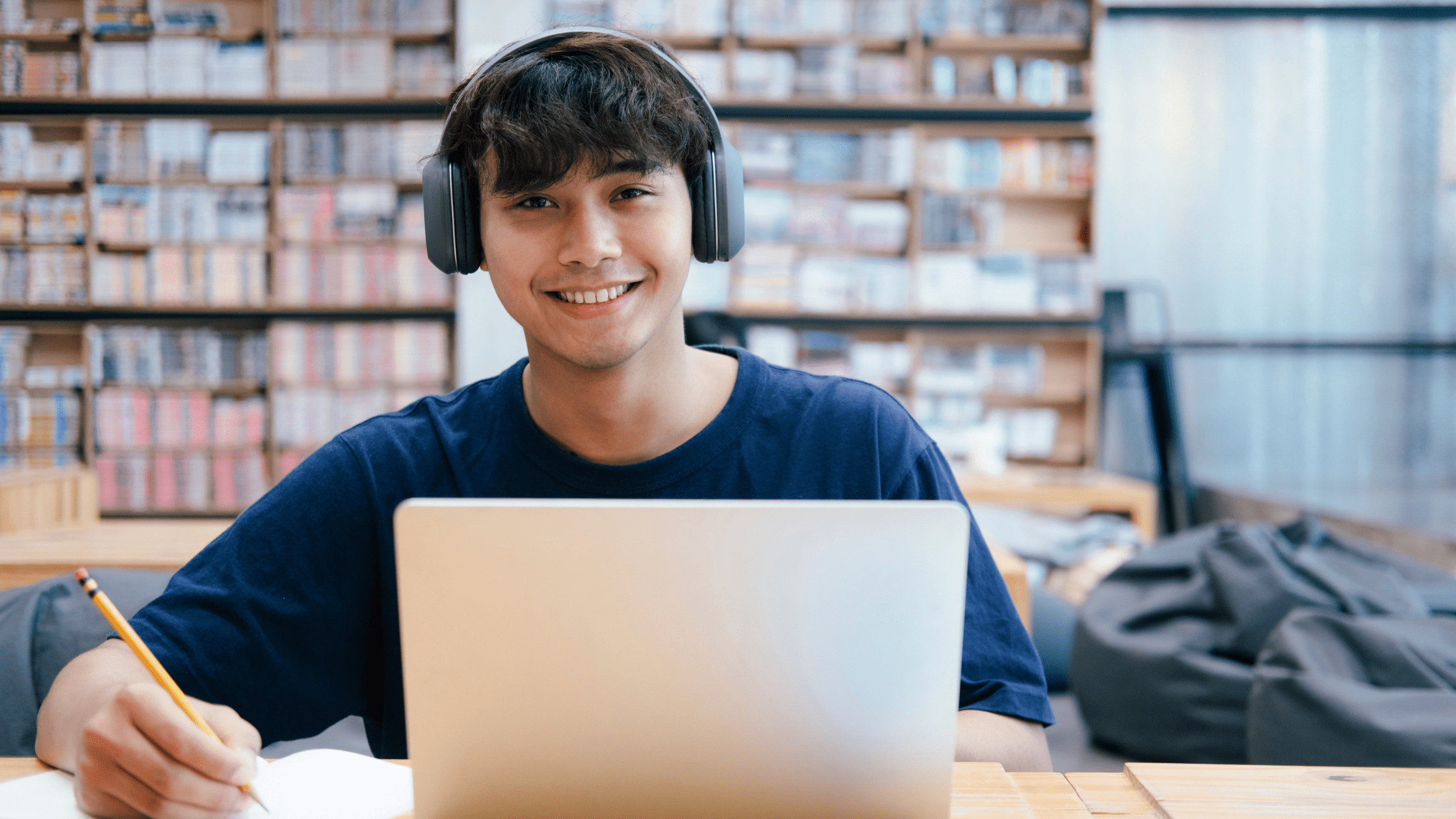 A medical school student studying for his USMLE exams in a library using Anki.